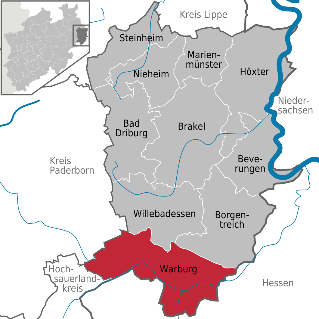 Auf der Abbildung sieht man oben links eine schematische Karte von Nordrhein-Westfalen mit Stadtgrenzen. In einer kleinen eingefügten Karte ist der Kreis Höxter dunkelgrau markiert. Zentral in der Hauptkarte ist der Kreis Höxter hervorgehoben, zu ihm gehört auch die Stadt Warburg, die unten in der Karte eingezeichnet ist. Die gesamte Darstellung ist in Grautönen gehalten.